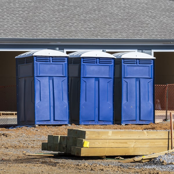 what is the cost difference between standard and deluxe portable restroom rentals in McCamey